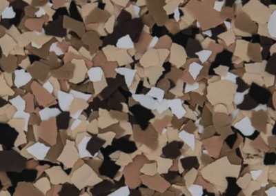 This image shows a flake epoxy called Outback which is composed of light and dark colored flakes.